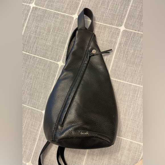 NWOT The Sak Black Leather Sling Backpack - New 5 pocket Leather 1 side canvas. - Picture 16 of 16